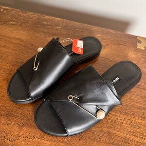 Nine West Black Slide Sandals with Gold Pin Accent